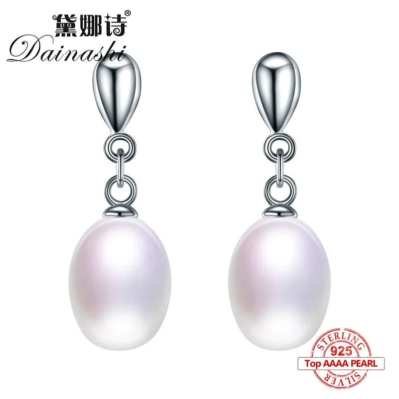Sophisticated pearl earrings from the Pearlescent Whisper Set, perfect for formal occasions.