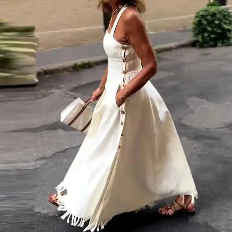 Lightweight polyester off-shoulder dress in soft pastel color, perfect for summer outings.
