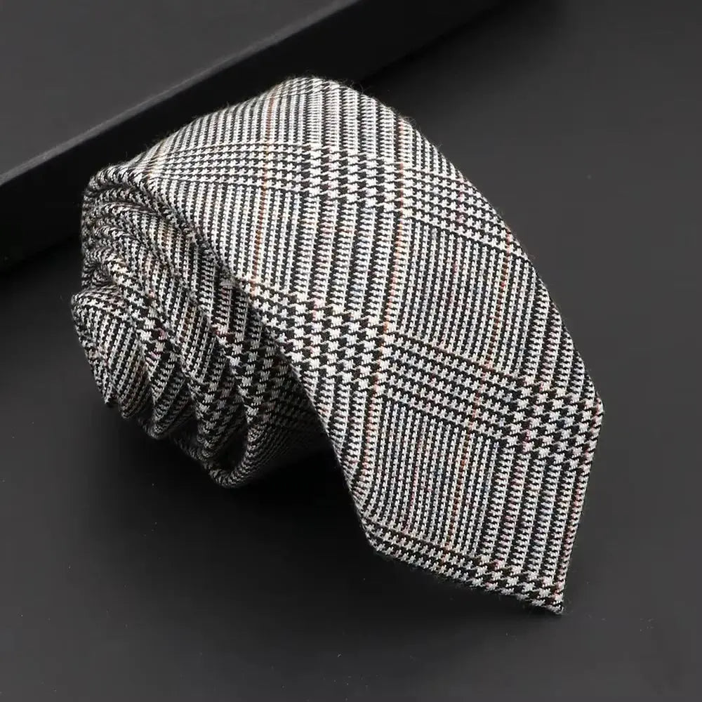 Lightweight black tie, ensuring comfort without sacrificing style.