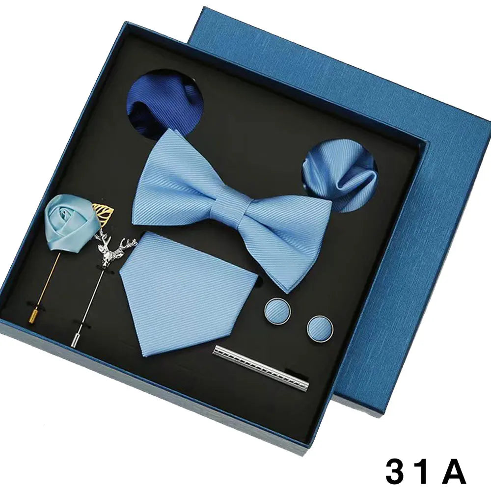 Sophisticated groomsmen gift set including necktie, bowtie, handkerchief and cufflinks