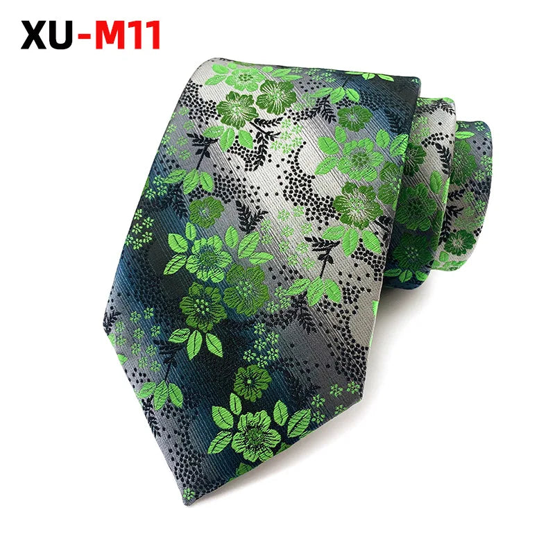 Blue tie displayed with accessories, enhancing men's fashion.