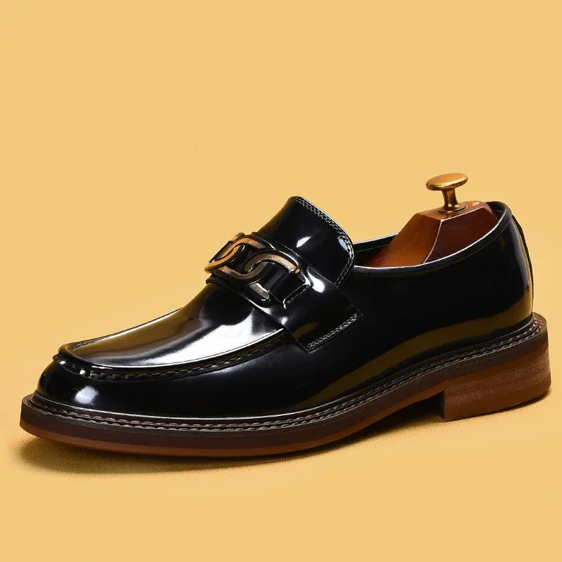 Men's leather loafers styled with dress pants for business casual look
