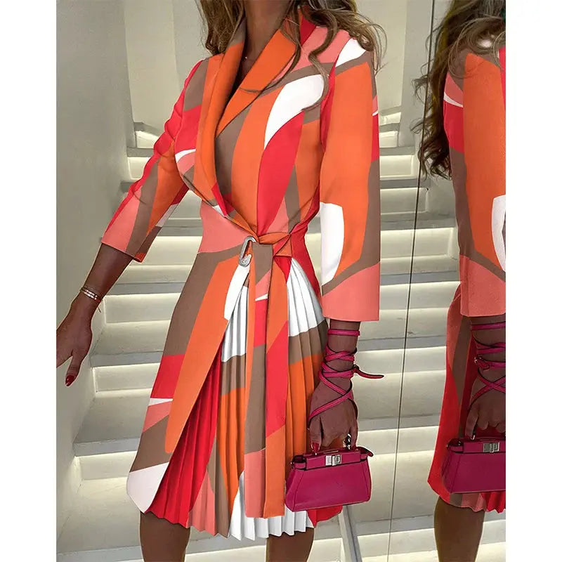 Flat lay of the Whimsical Autumn Midi dress, featuring its vibrant vintage print and easy-care fabric.