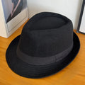 Charcoal Whispers Fedora styled with autumn fashion, perfect for seasonal wear and sophistication.