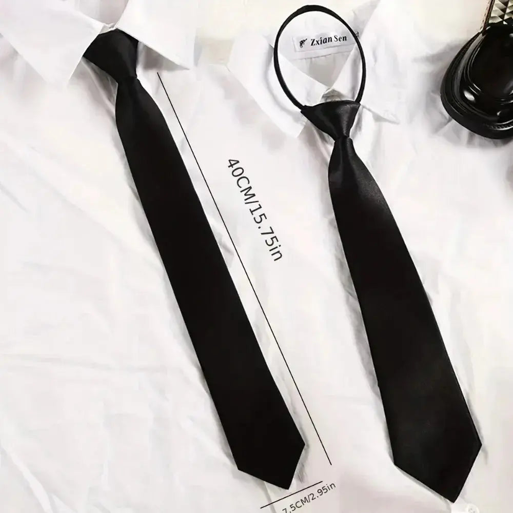 Elegant black tie displayed against a classic suit, highlighting its versatile styling.