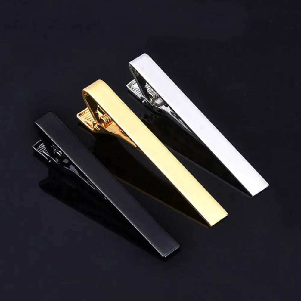 Sleek stainless steel tie clip with a polished finish for modern men.