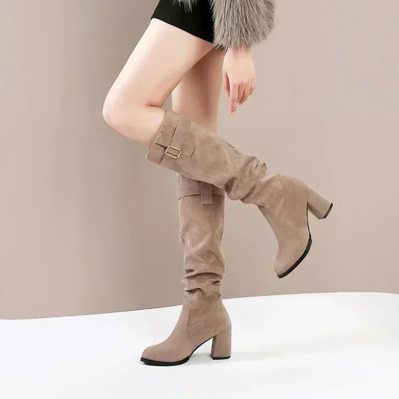Mid-calf suede boots with pleated texture detail and comfortable square heel design