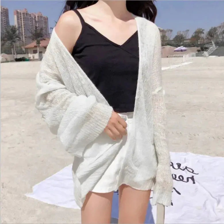 Side view of the Summer Breeze Knit Cardigan, highlighting its airy design and sophisticated look.