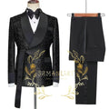 Black tuxedo ensemble with double-breasted jacket and slim fit design.