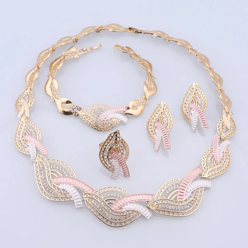 Four-piece wedding jewelry collection featuring vibrant multicolor crystals in plant-inspired design