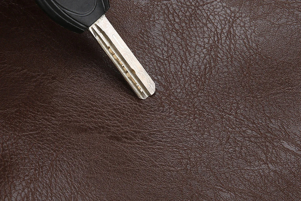 Versatile crossbody messenger combining bucket shape storage with professional aesthetic design