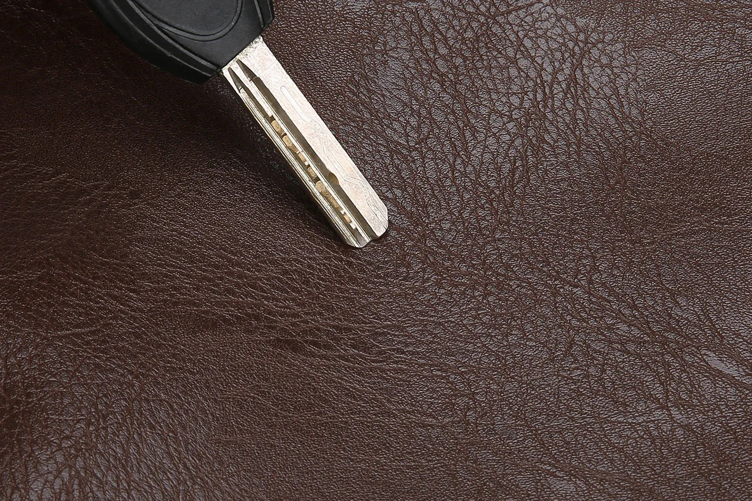 Versatile crossbody messenger combining bucket shape storage with professional aesthetic design