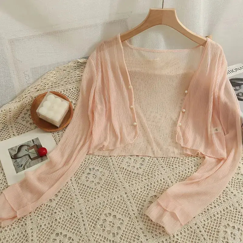 Single-breasted Summer Breeze Cardigan showcasing a chic, versatile design.