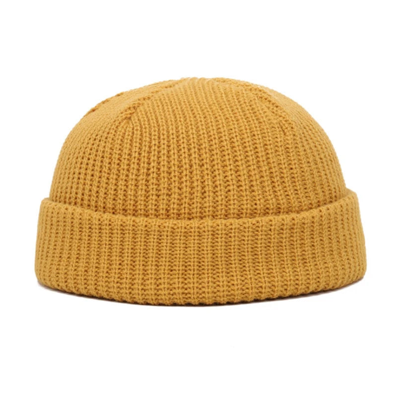 Cozy Confidence Cap in cream, showcasing its snug fit and stylish skullcap design.