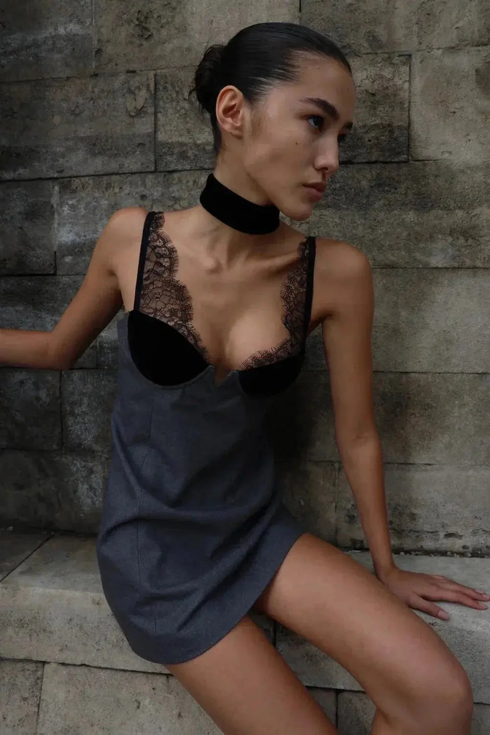 Model showcasing the slim fit design of the Velvet Twilight dress.