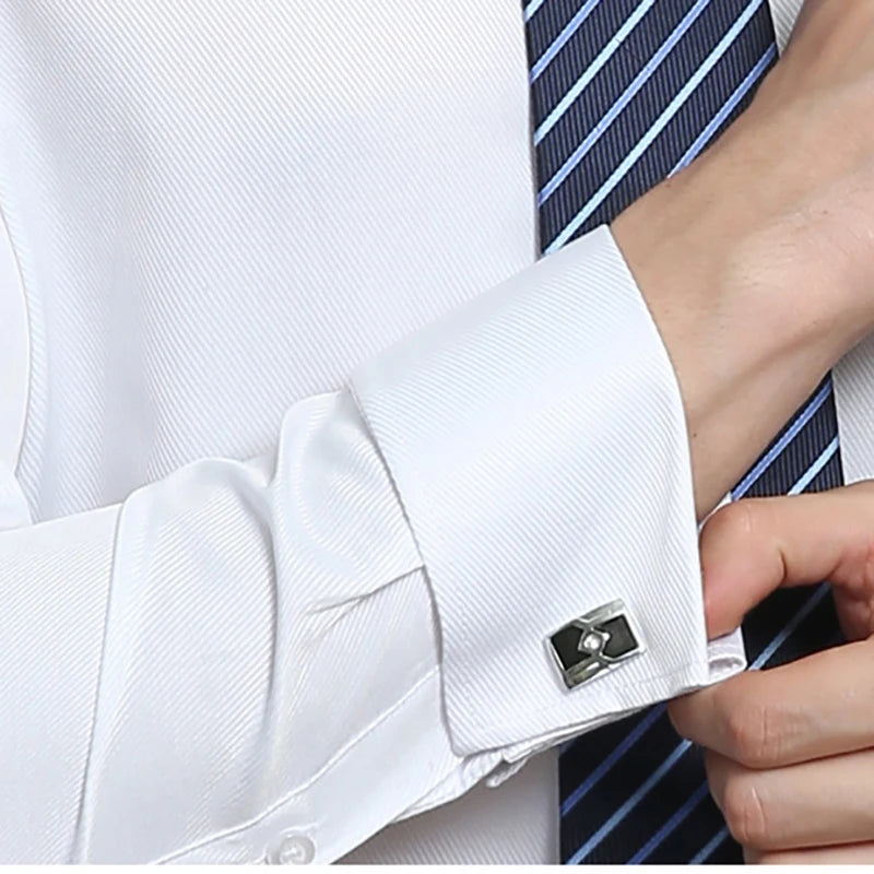 White French cuff dress shirt with chest pocket and turn-down collar on neutral background