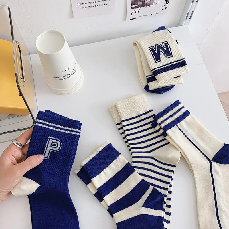 Minimalist blue striped design socks, perfect for day-to-night transitions.