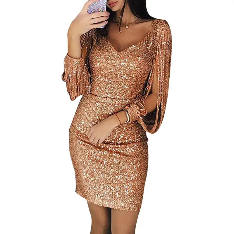Detail shot of the v-neckline on the Midnight Shimmer plus-size sequin mini dress.
