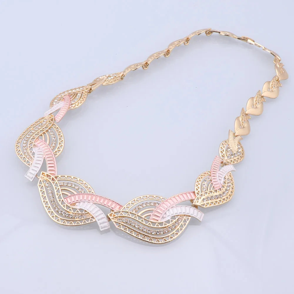 Radiant bridal necklace, bracelet, earrings and ring set with shimmering multicolor crystal stones