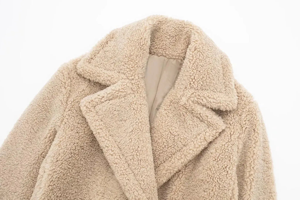 Back view of the Winter Whisperer coat, emphasizing its timeless style and sophisticated silhouette.