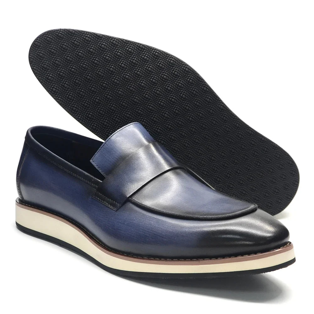 Business professional wearing genuine leather penny loafers with complimentary shoe horn included