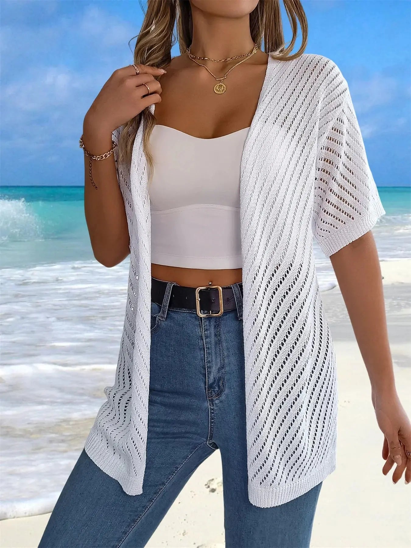 Casual summer top featuring a flowing fit and breathable knit for comfort.