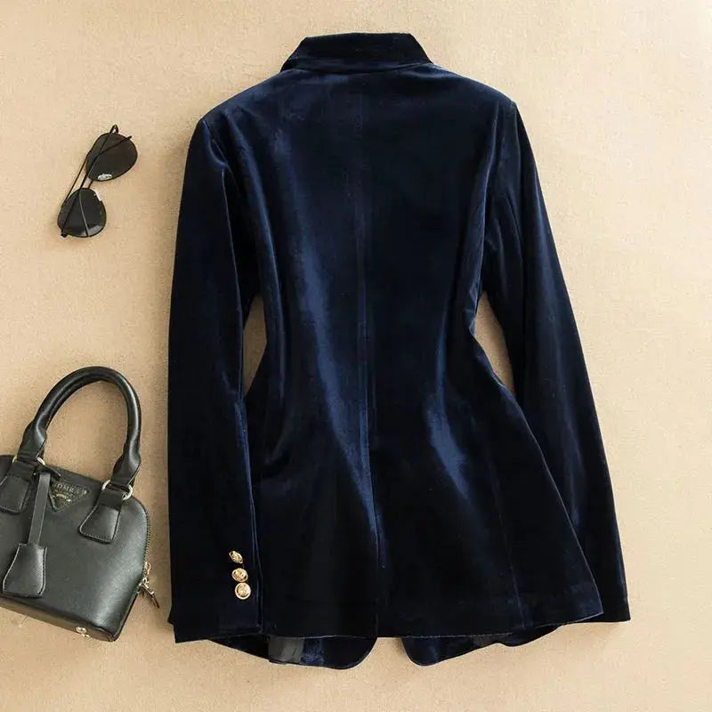 Luxurious golden velvet blazer showcasing a tailored fit for a polished silhouette.
