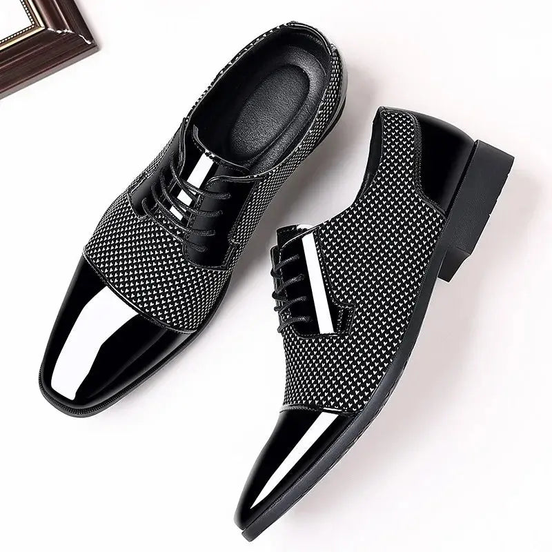 Side view of black Oxford shoes highlighting their sleek design.