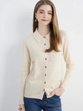 Model pairing the Merino Wool Cardigan with casual attire, showcasing its versatility.
