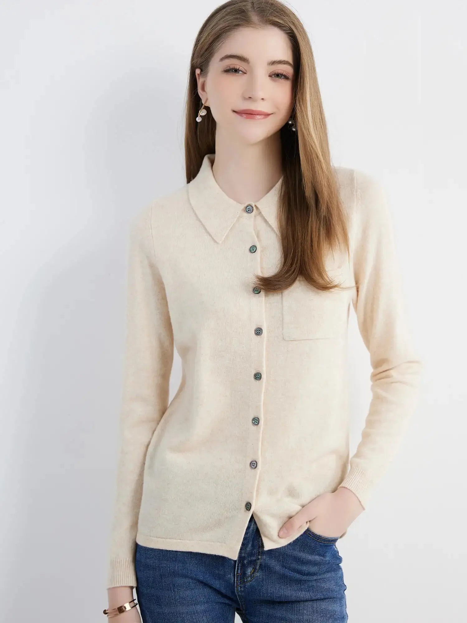 Model pairing the Merino Wool Cardigan with casual attire, showcasing its versatility.