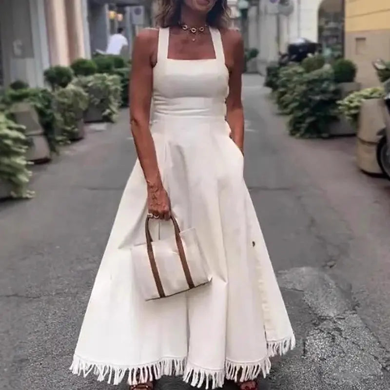Elegant off-shoulder design of the Summer Breeze Dress, ideal for day to night transitions.