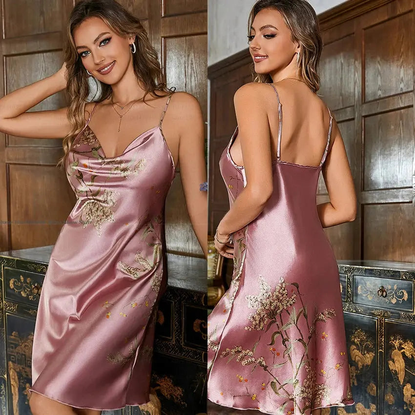 Close-up of the delicate cherry blossom print on luxurious satin fabric.