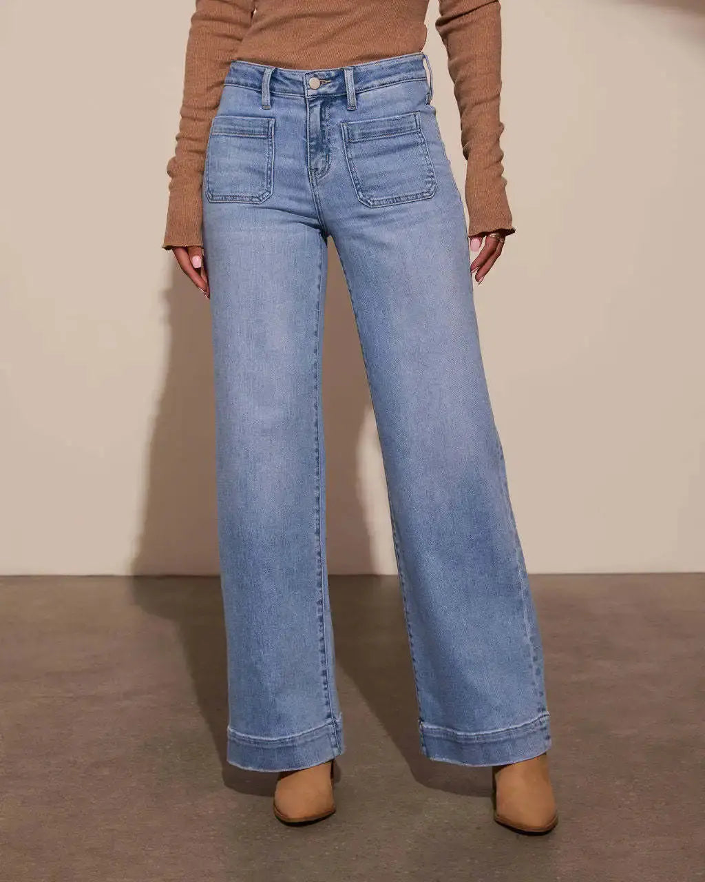 Detail shot of Retro Chic Jeans' stitching and fabric, highlighting durability and quality craftsmanship.