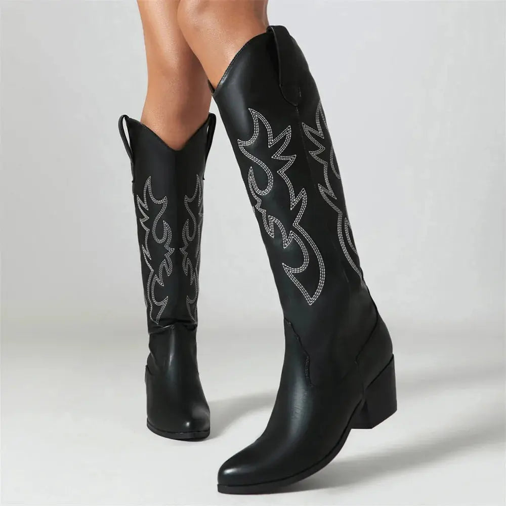 Women's knee-high Western boots in premium vegan leather featuring decorative embroidered details and stable block heel