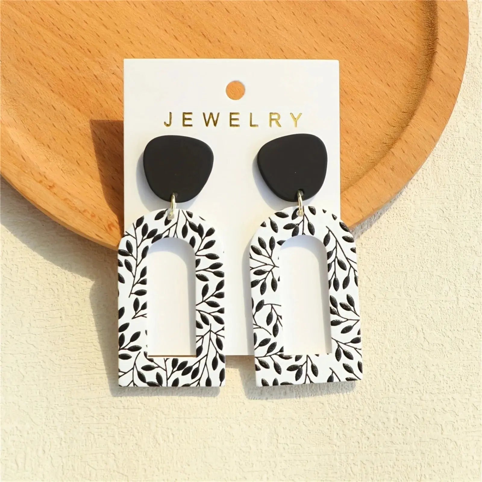 Model wearing Whispering Leaves Drop Earrings, perfect for casual and formal outfits with a minimalist touch.