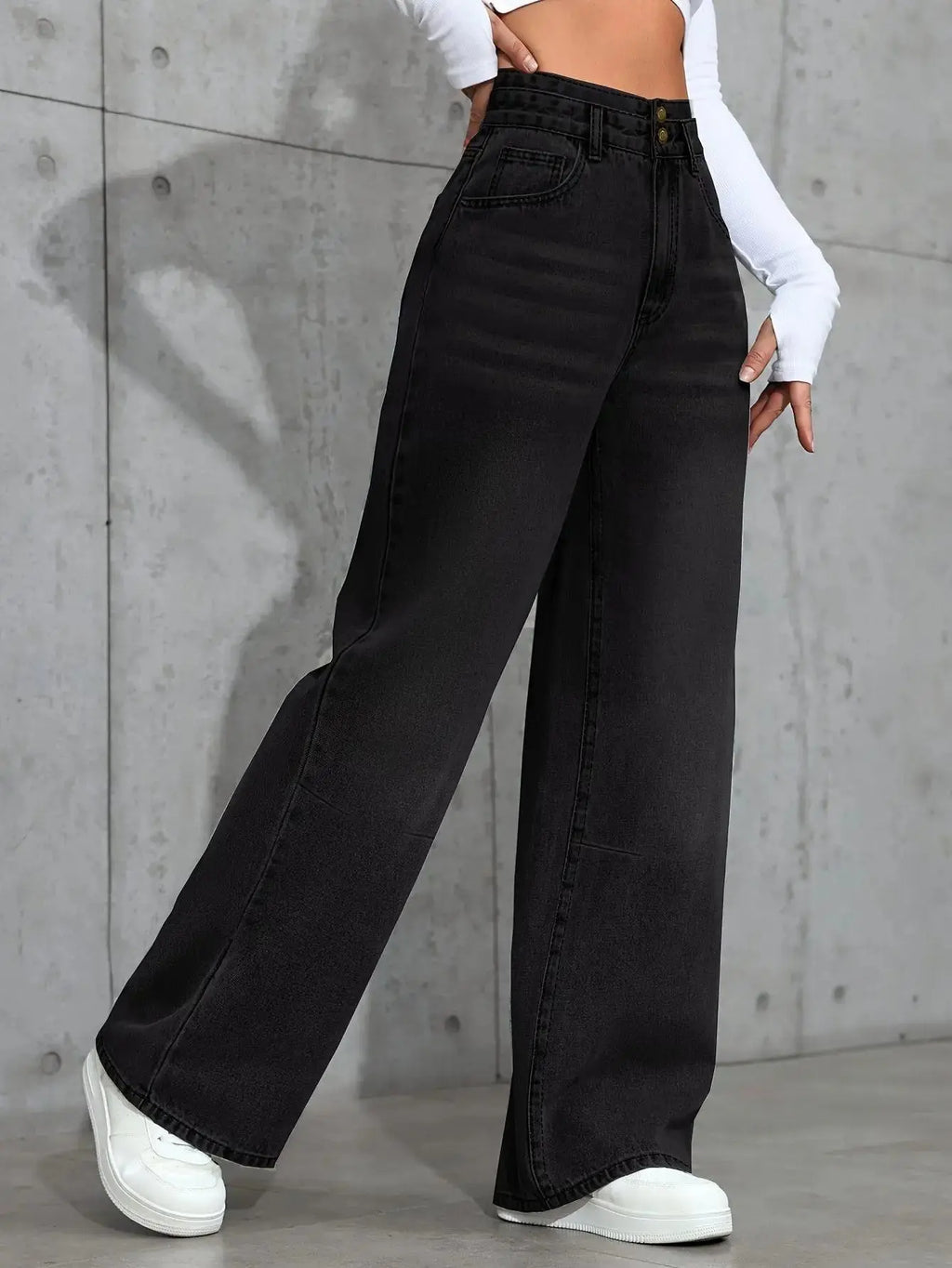 Back view of high-waist jeans highlighting the flattering silhouette and comfortable fit.