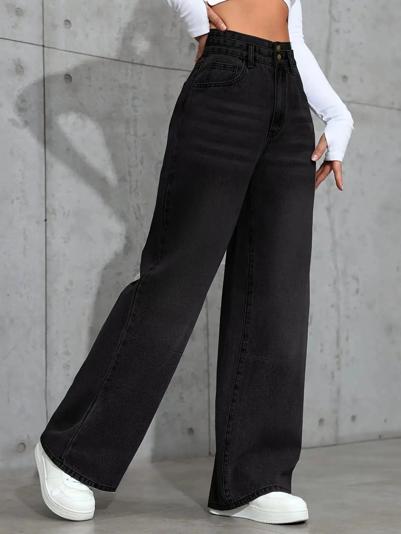 Back view of high-waist jeans highlighting the flattering silhouette and comfortable fit.