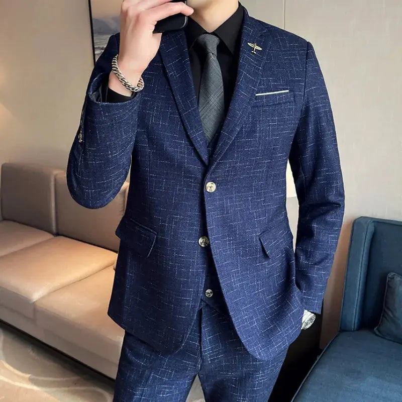 Close-up of the tailored lapel and button details on the sophisticated men's wedding suit.