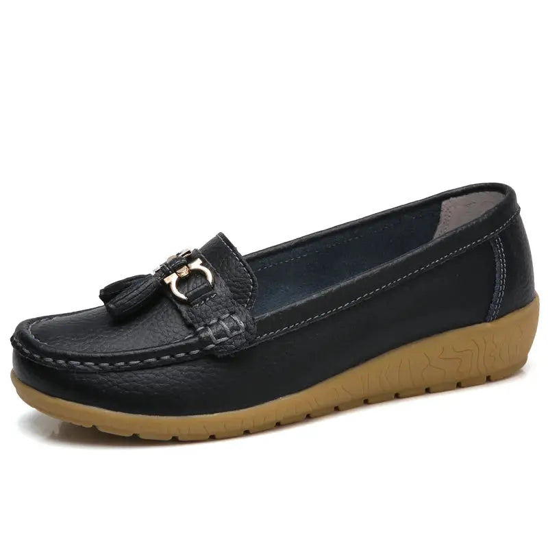 Stylish white slip-on shoes for casual business ensembles.