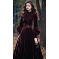 Back view of the Midnight Whispers Velvet Dress, showcasing its elegant design and comfortable fit.