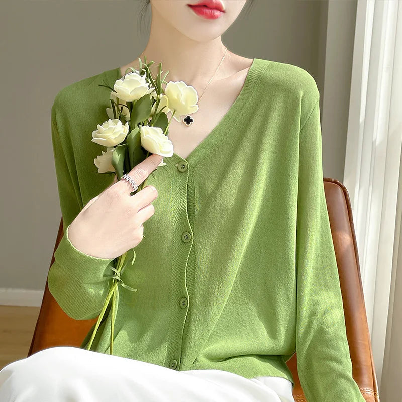 Detail shot of the thin profile of the Breeze Whisper Cardigan, ideal for layering without bulk.