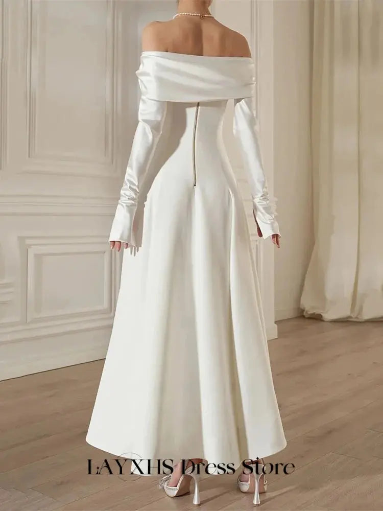 Flowing ankle-length tulle skirt of the Enchanting Aisle Moment gown, perfect for graceful movement.