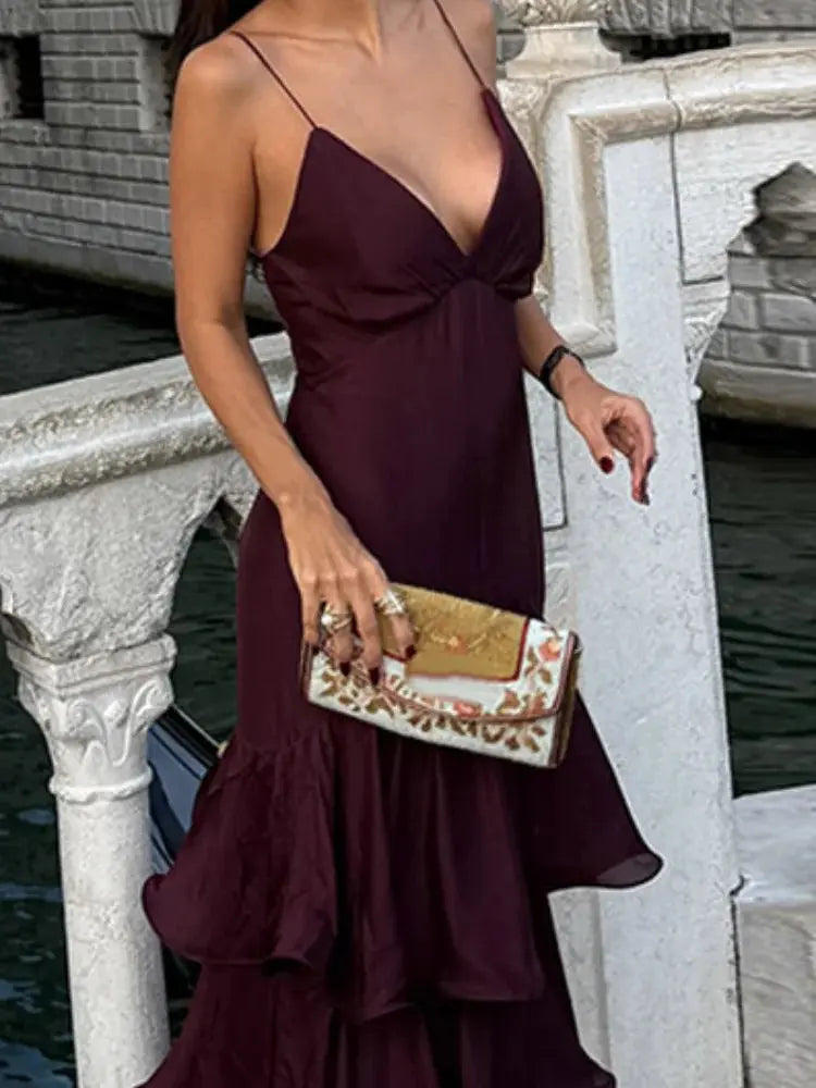 Elegant backless halter gown in soft cotton-polyester blend, perfect for galas.