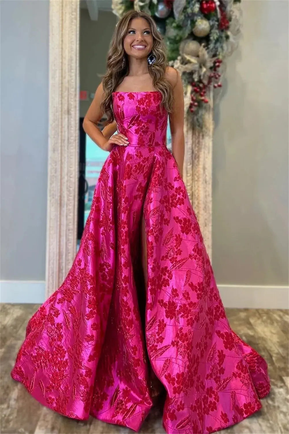 Side view of the Fuchsia Flair Prom Dress with high slit, capturing its dramatic and sophisticated style.