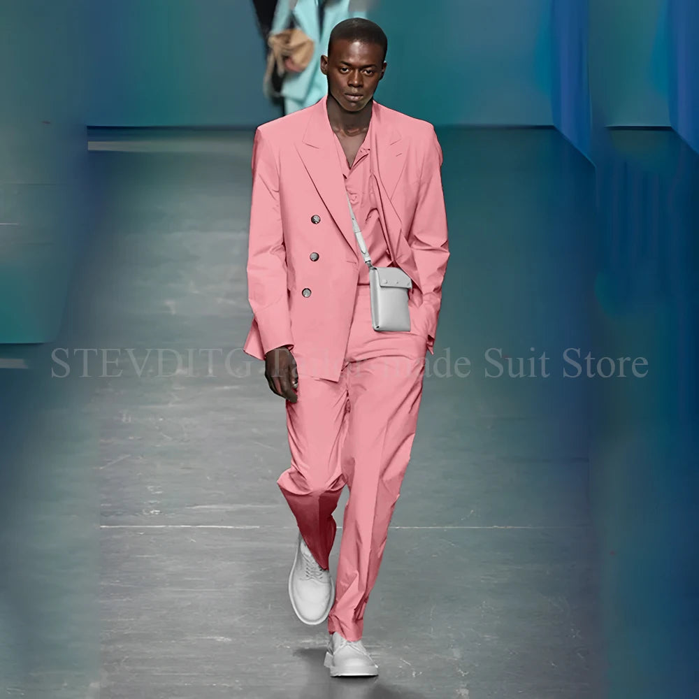 Model adjusting Azure Allure suit jacket, showcasing its comfortable fit and modern twist.