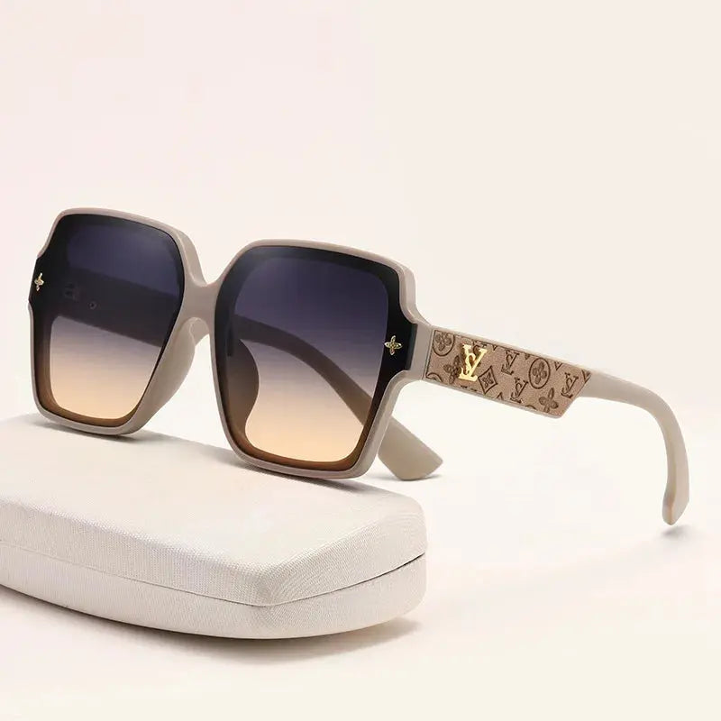 Chic square frame sunglasses with UV400 protection in sleek black design.