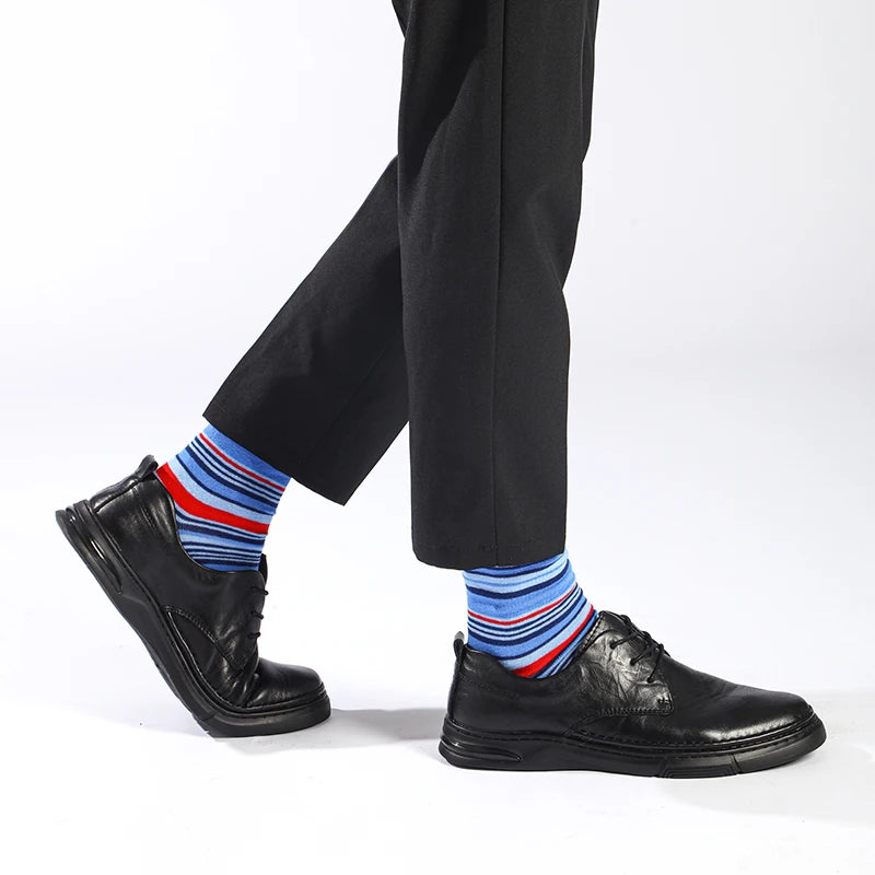 Elegant blue dot socks adding personality to men's fashion.