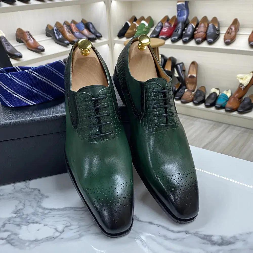 Elegant green Oxford shoes showcasing detailed craftsmanship.