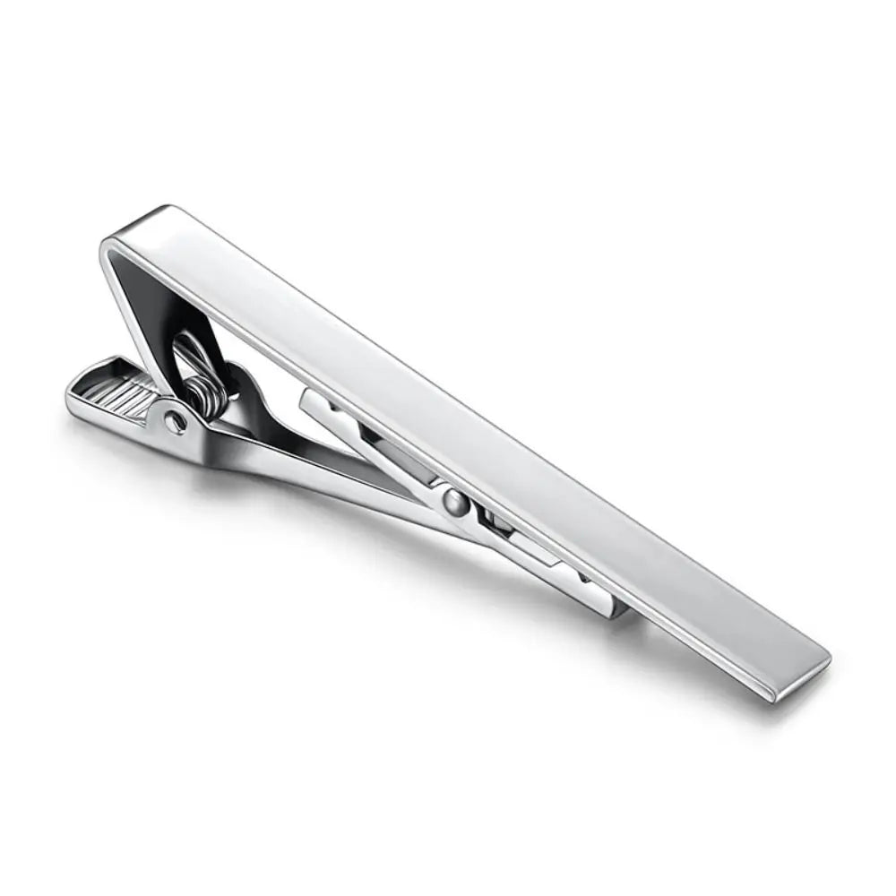 Close-up of a stylish tie clip, showcasing its elegant craftsmanship.