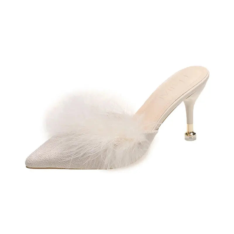 Fashionable summer mules with pointed toe and elegant design, perfect for any occasion.